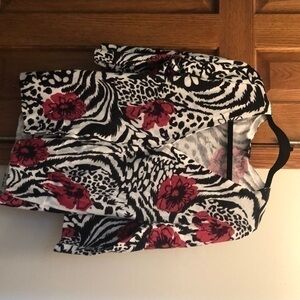 Black pink and white button up sweater